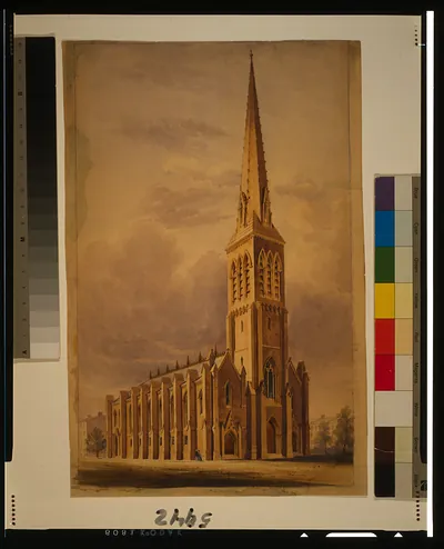 [Exterior view of masonry church with axial tower entrance and spire]