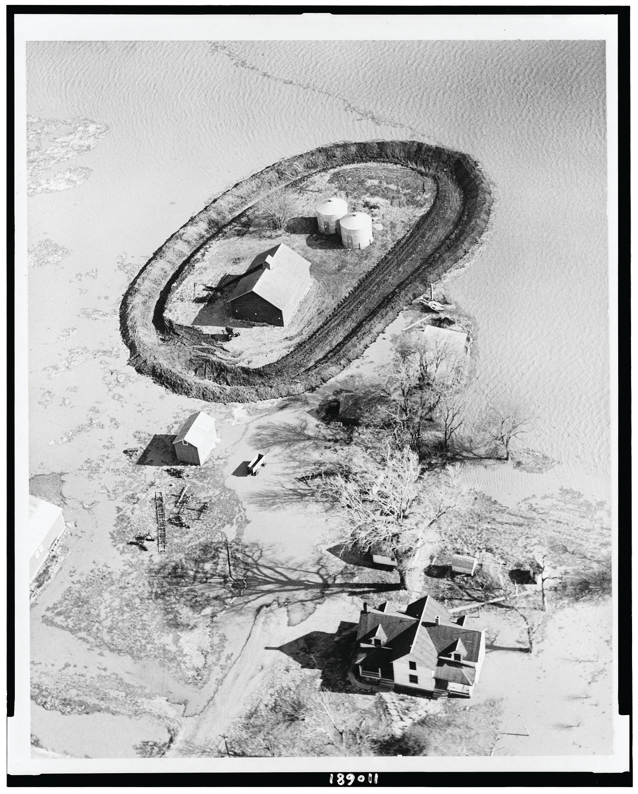 Big ditch" [plowed dike for protection from flood waters]", 1950 — historic photograph