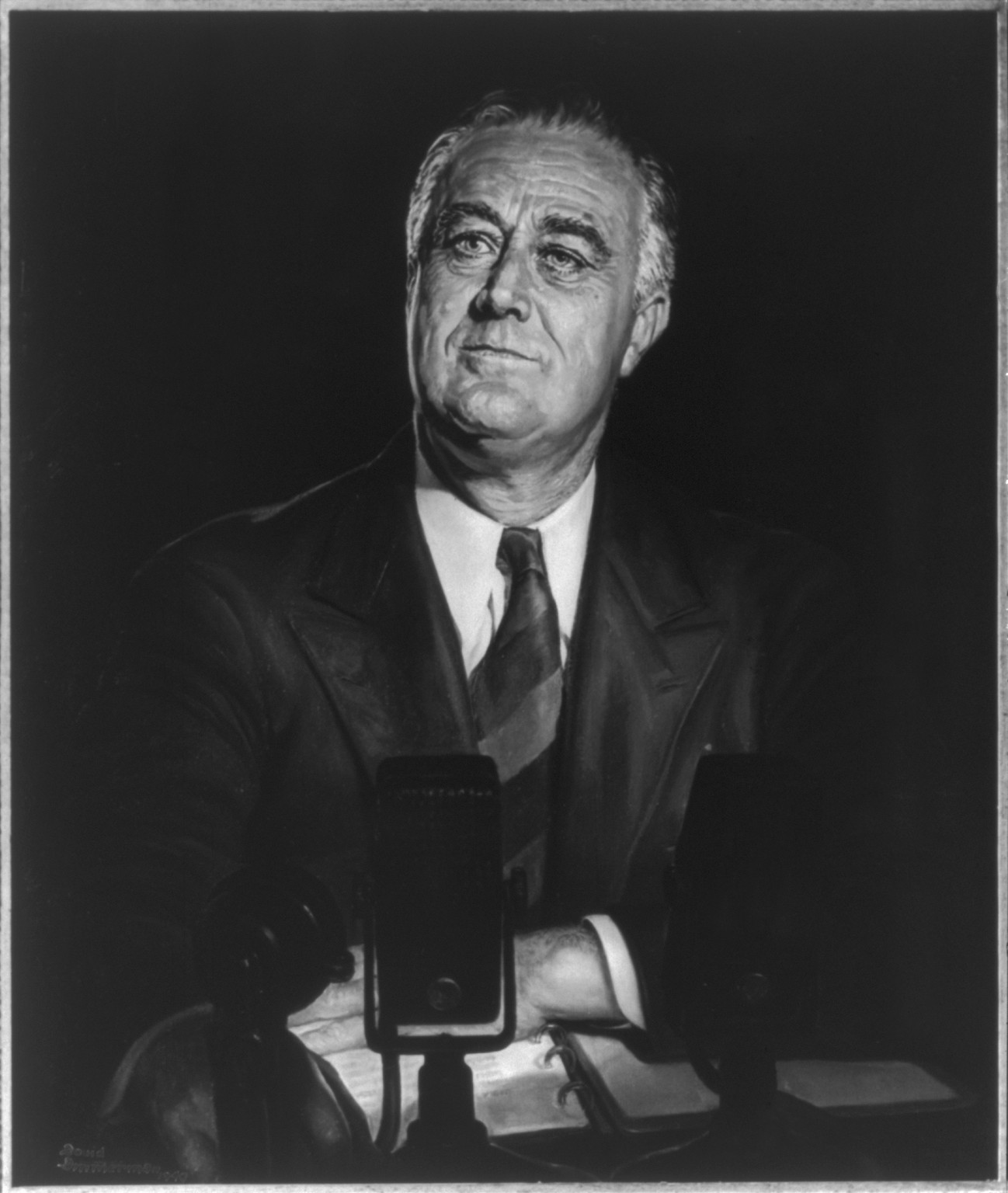 [Franklin Delano Roosevelt, bust portrait, seated at desk, facing slightly left; in front of radio microphones] — historic photograph