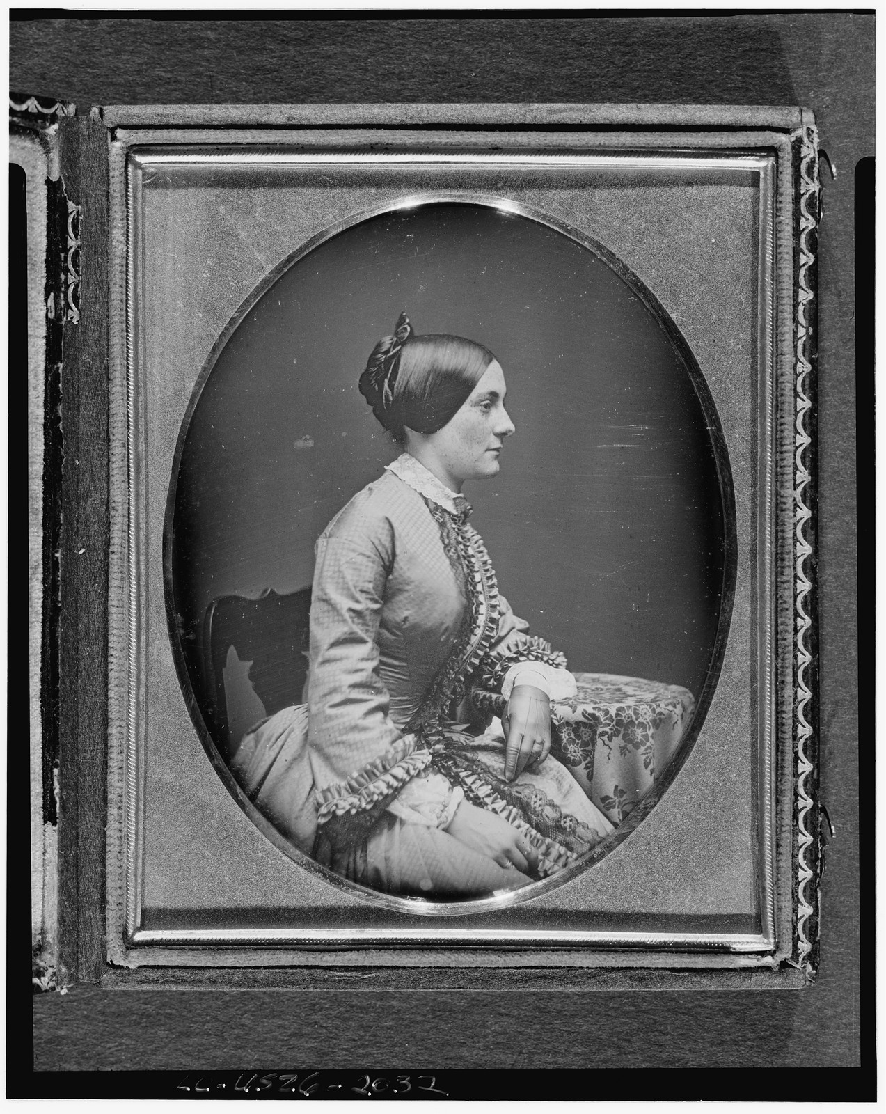 Seated woman in profile, daguerreotype portrait, c. 1850, 1850 — historic photograph