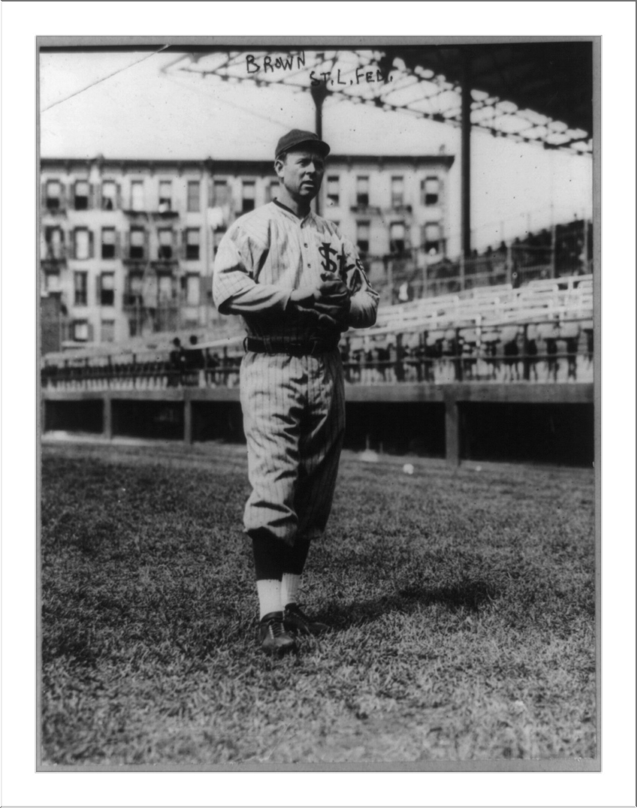 [Mordecai Peter Centennial Brown, baseball player for the St. Louis Federals, full-length portrait, standing, facing slightly right, in uniform], 1914 July 31. — historic photograph