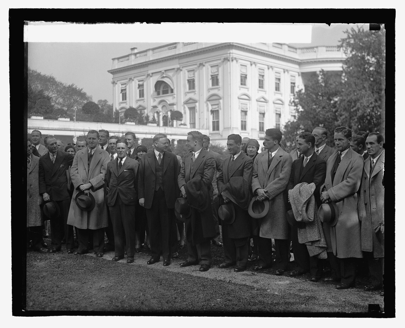 Hoover & Univ. of Cal. football team, 10/16/29, [19]29 October 16. — historic photograph