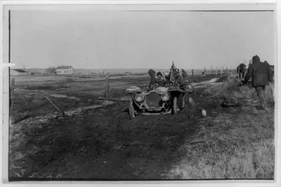 [Automobile on muddy rural road during race between New York and San Francisco]