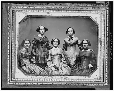 [Clark sisters, five women, three-quarter length portraits, all facing front]