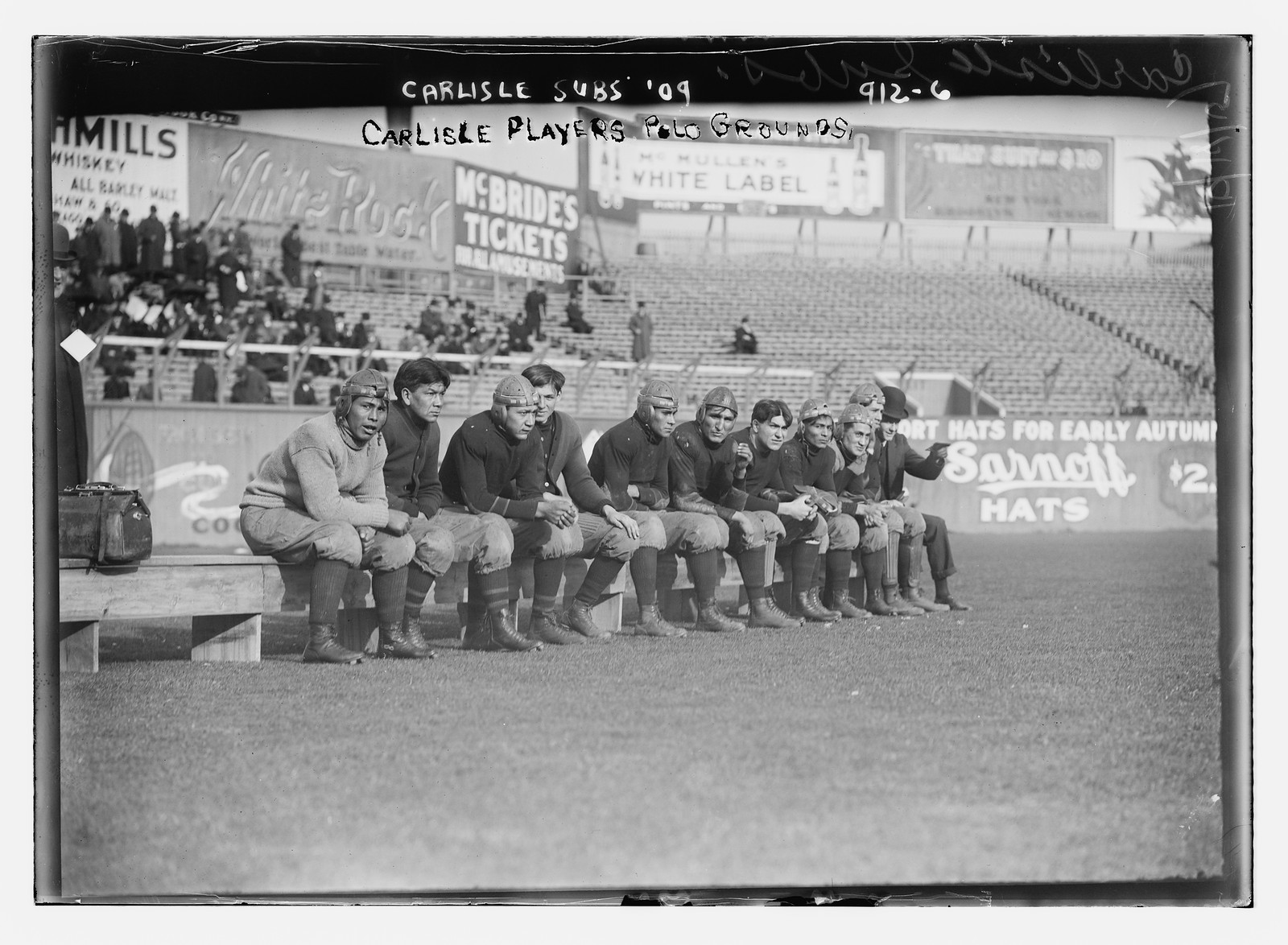 Carlisle substitutes on bench, Carlisle Polo Grds., 1909 — historic photograph