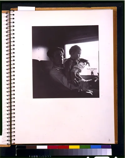 [Father and child on train]