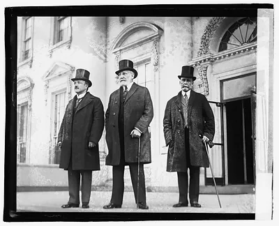 [Three men outside White House], 3/22/21