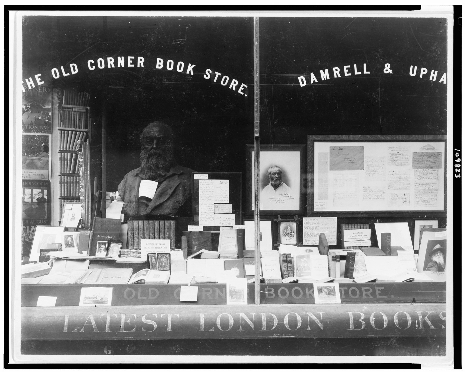[Display of books and memorabilia of Walt Whitman, in window of The Old Corner Book Store], [between 1897 and 1899] — historic photograph