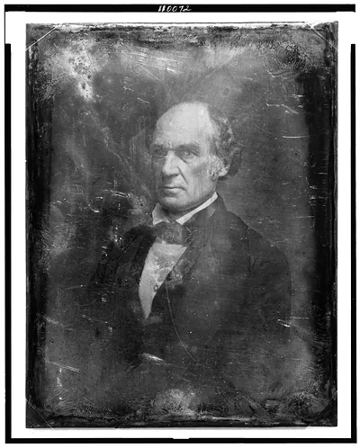 Daguerreotype portrait of a balding man in dark coat