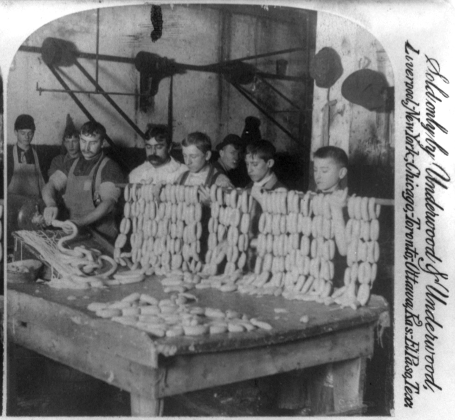 Filling skins, sausage department, Armour's great packing house, Chicago, U.S.A., New York, N.Y. : Strohmeyer & Wyman, c1893. — stereograph