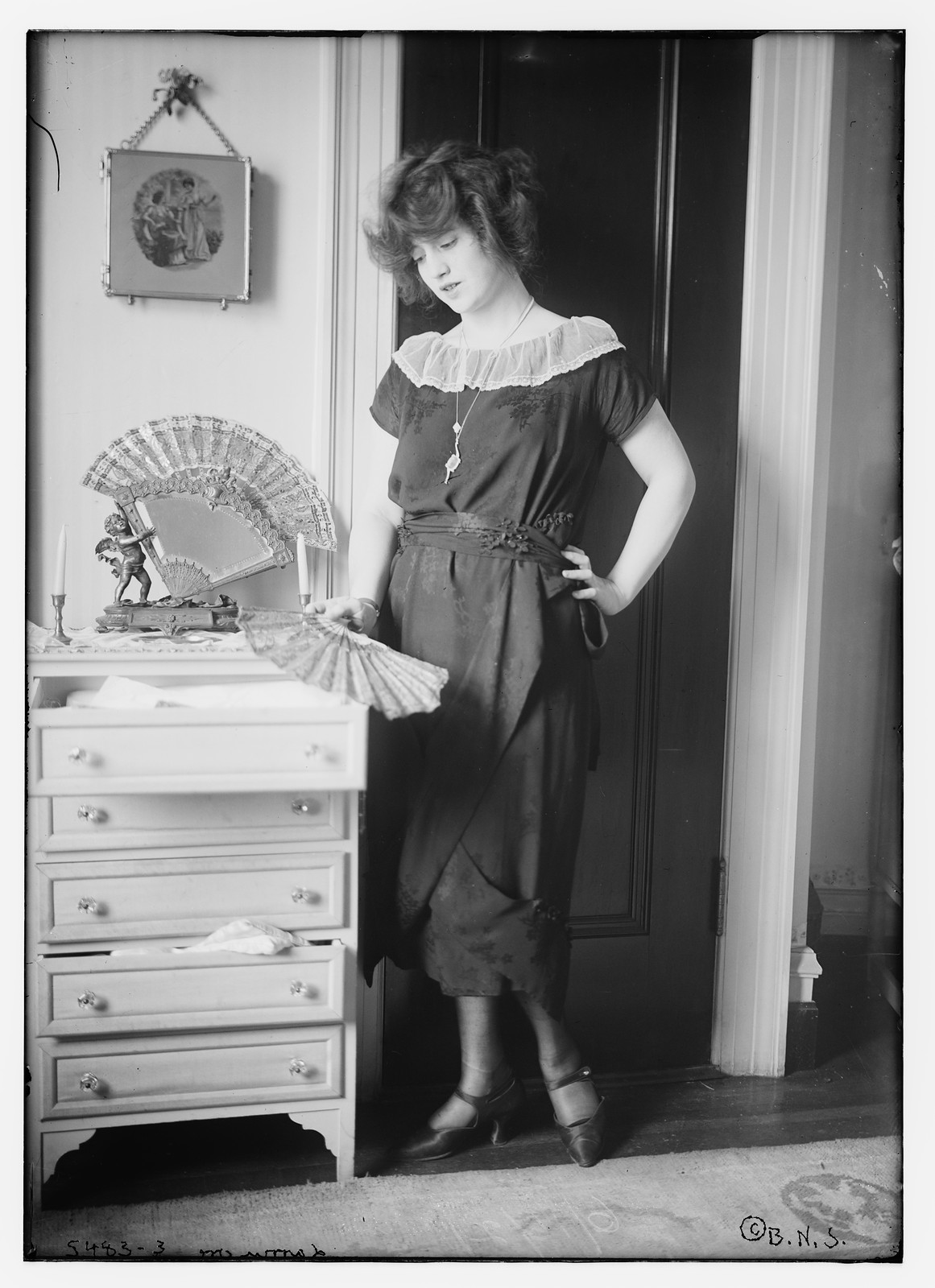 Larrmore holding fan, n/a — historic photograph