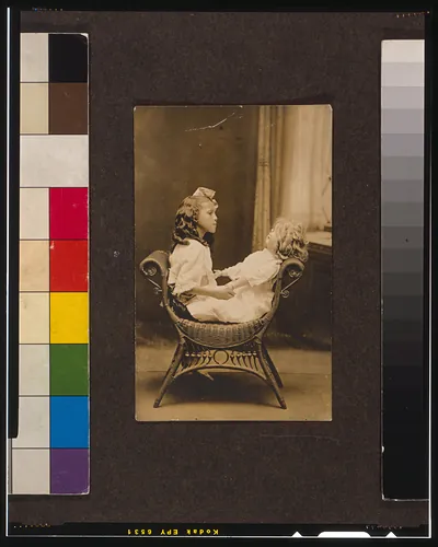 [Postcard addressed to Miss (Nannie Helen?) Burroughs, from Sarah Ellen, showing girl, possibly a student at the National Training School for Girls, Washington D.C., seated on chair with doll]