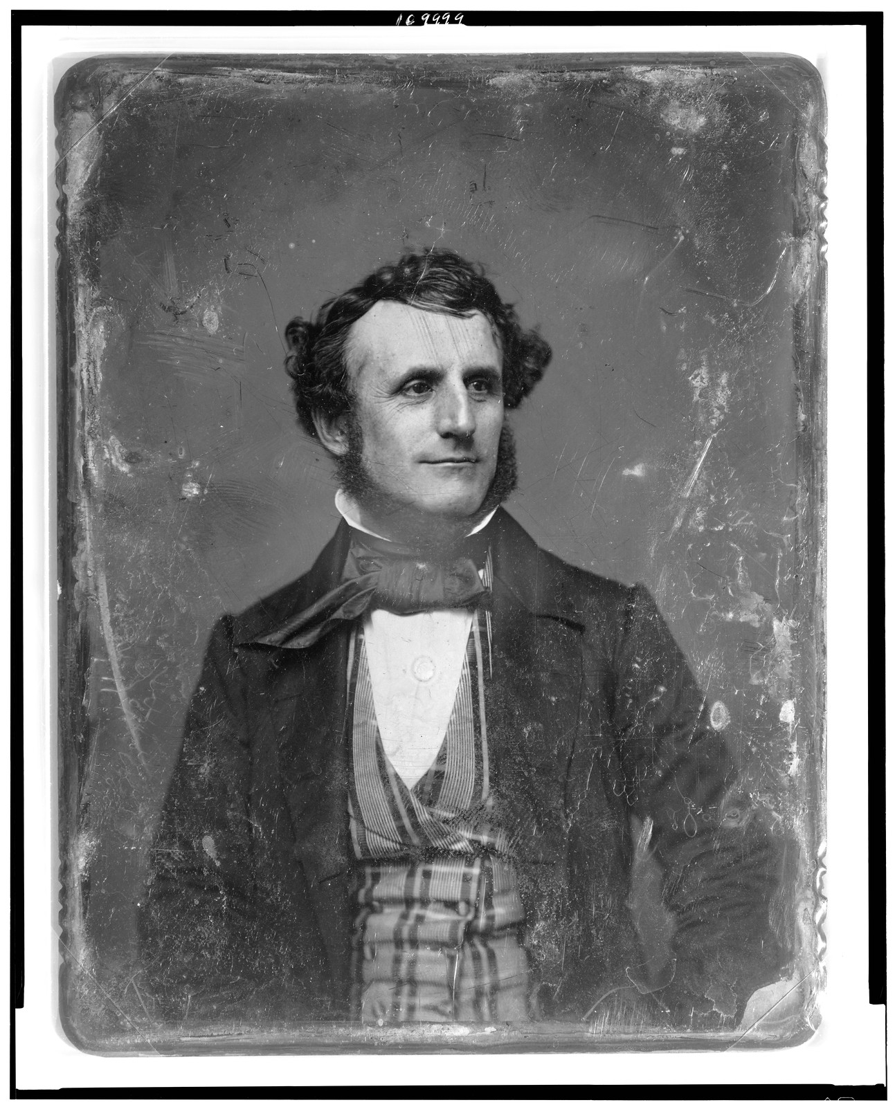 Portrait of an unidentified man with curly hair and cravat, 1844 — historic photograph