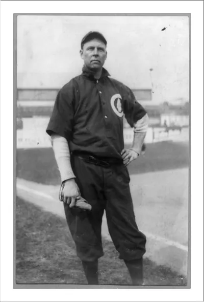 [Mordecai Peter Centennial Brown, (Three Finger Brown), baseball player for Chicago National League, posed, standing, on baseball field]