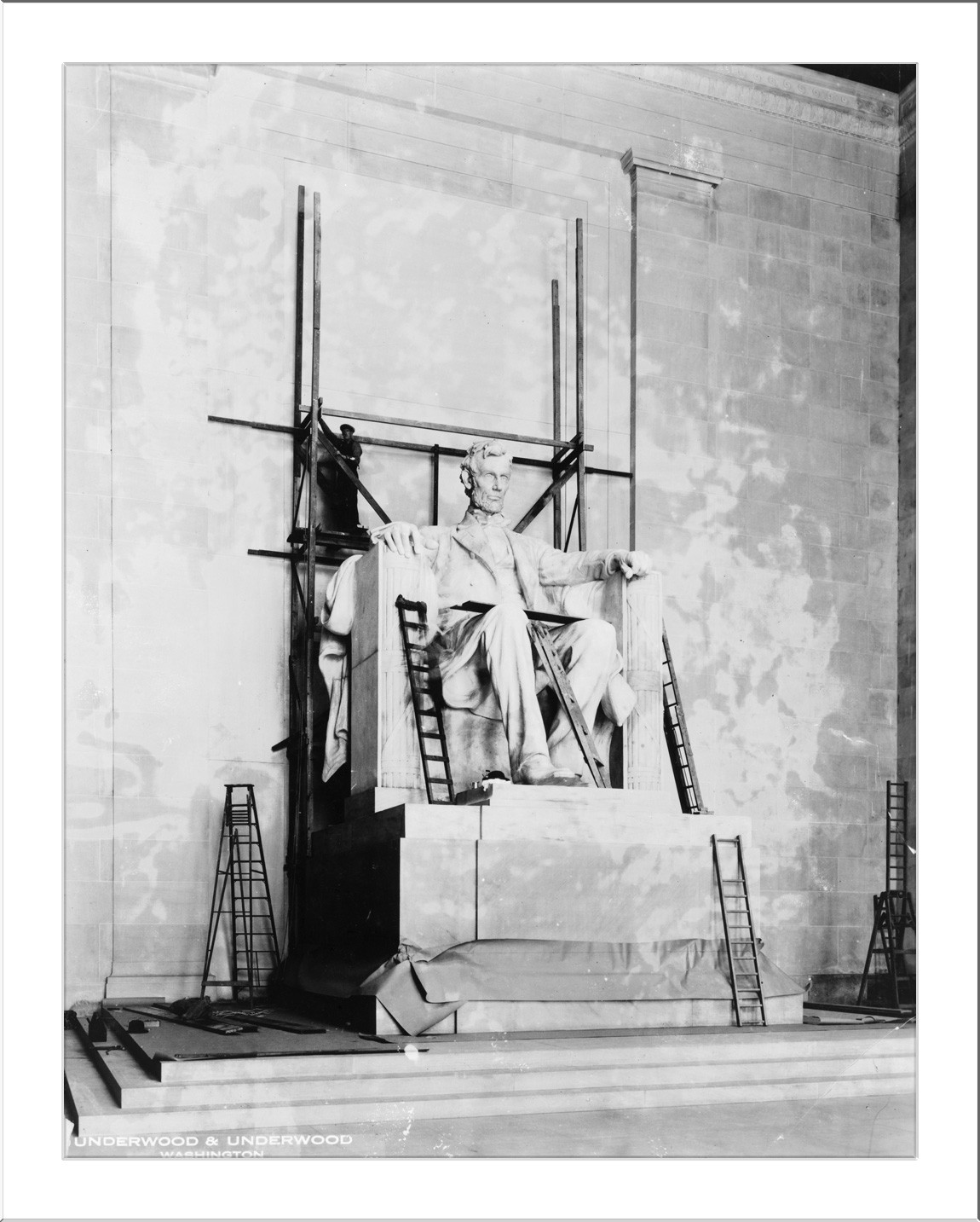 Seated Lincoln statue under scaffolding in Lincoln Memorial, photograph — historic photograph