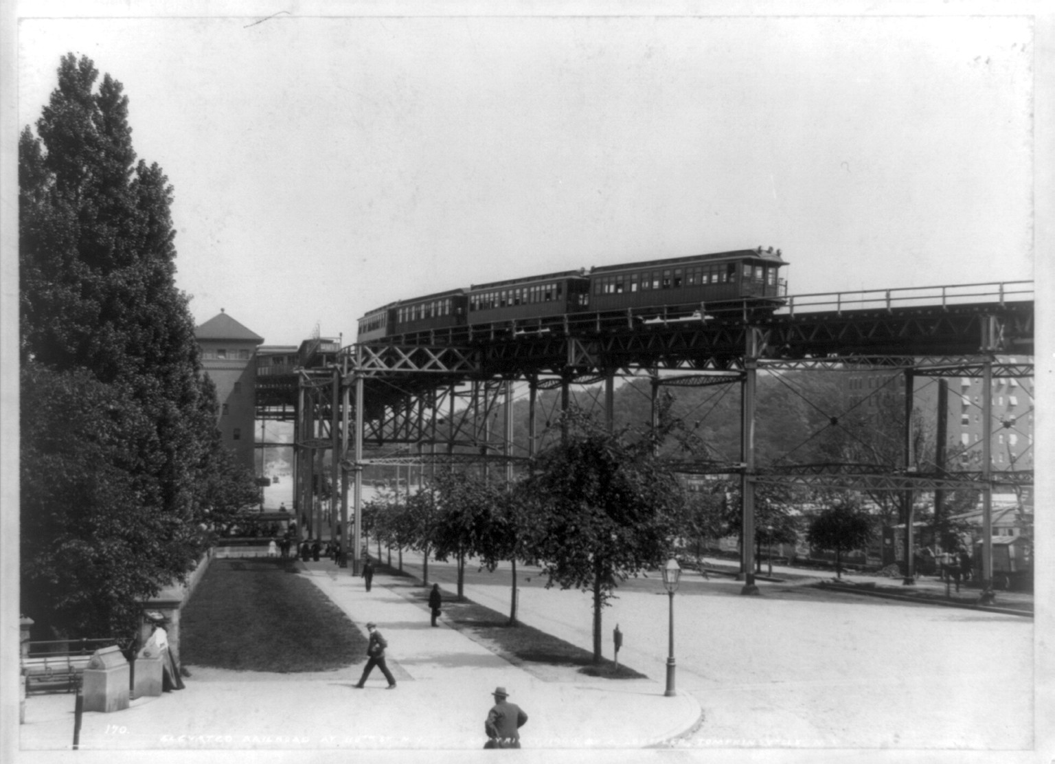 Elevated railroad at 110th St., N.Y. / A. Loeffler, Tompkinsville, N.Y., c1904. — historic photograph