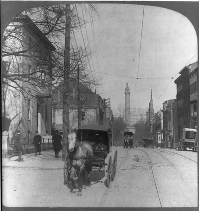 Cardinal Gibbons home [left foreground] and Washington Monument on North Charles Street, Baltimore, Md.