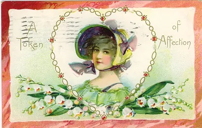 Postcard reading "A Token of Affection" with woman and lily of the valley