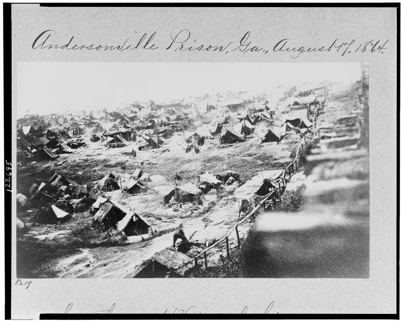Andersonville Prison, Ga., August 17, 1864--Southwest view of stockade showing the dead-line, [photographed 1864, printed later] — historic photograph