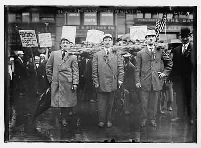 Labor Day Parade, bakers carrying float of loaf of bread, New York