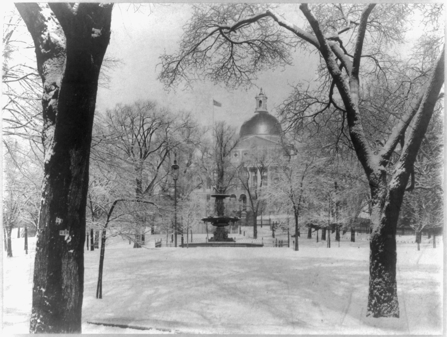 Snow-covered Boston Common with fountain and State House dome, 1897 — historic image