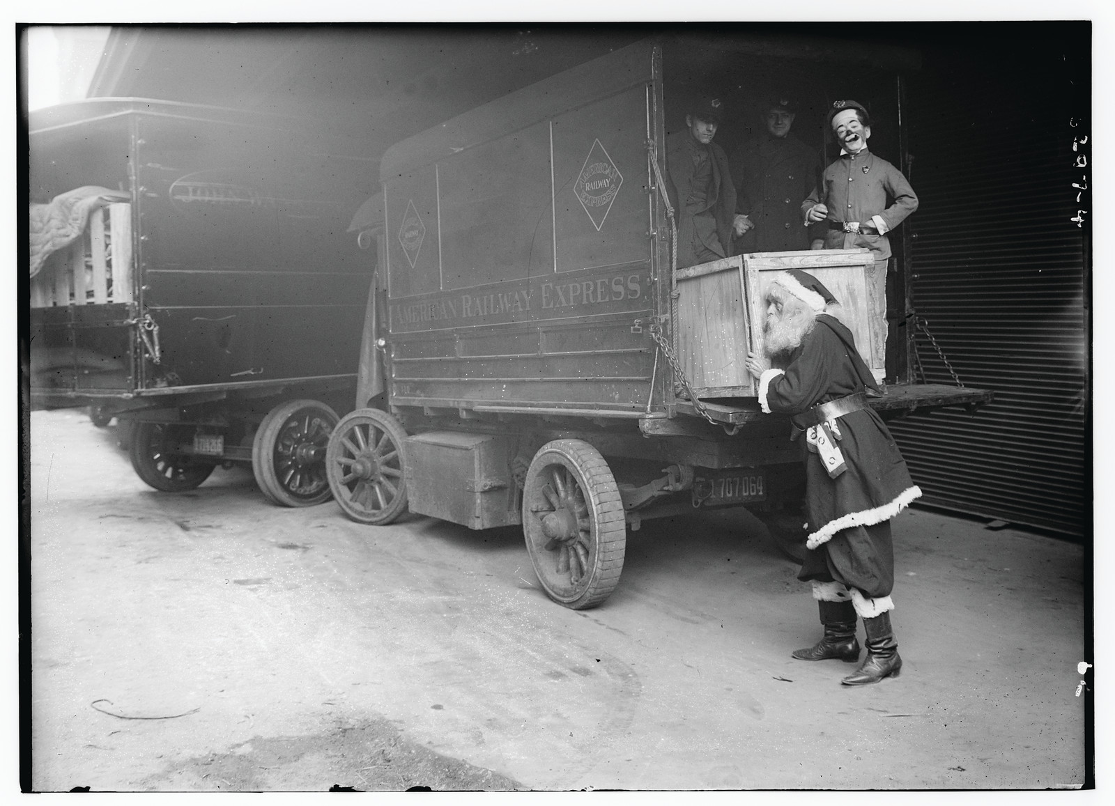 Loading railway express car, n/a — historic photograph