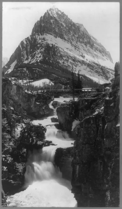 Stark Peak and water falls, Glacier National Park, Montana