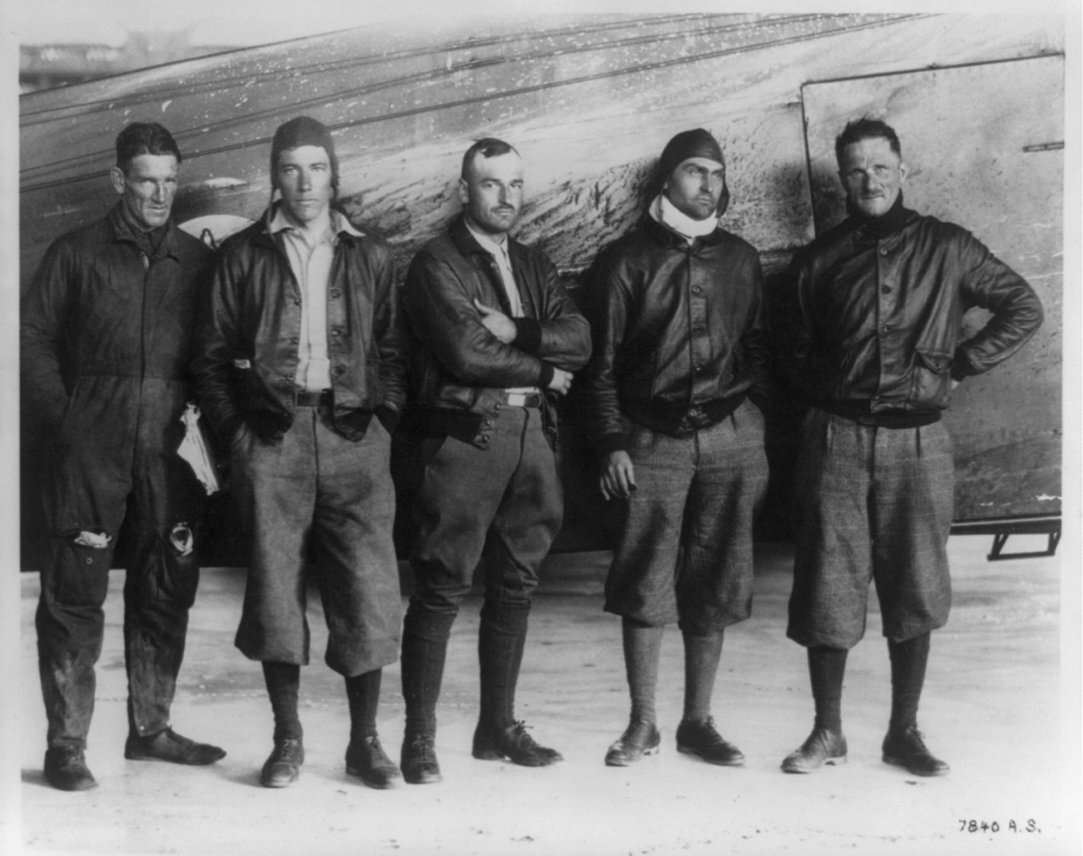 [Official air force photographs of Ira Eaker and his contemporaries: 5 pilots posed by plane], [between 1917 and 1947] — historic photograph