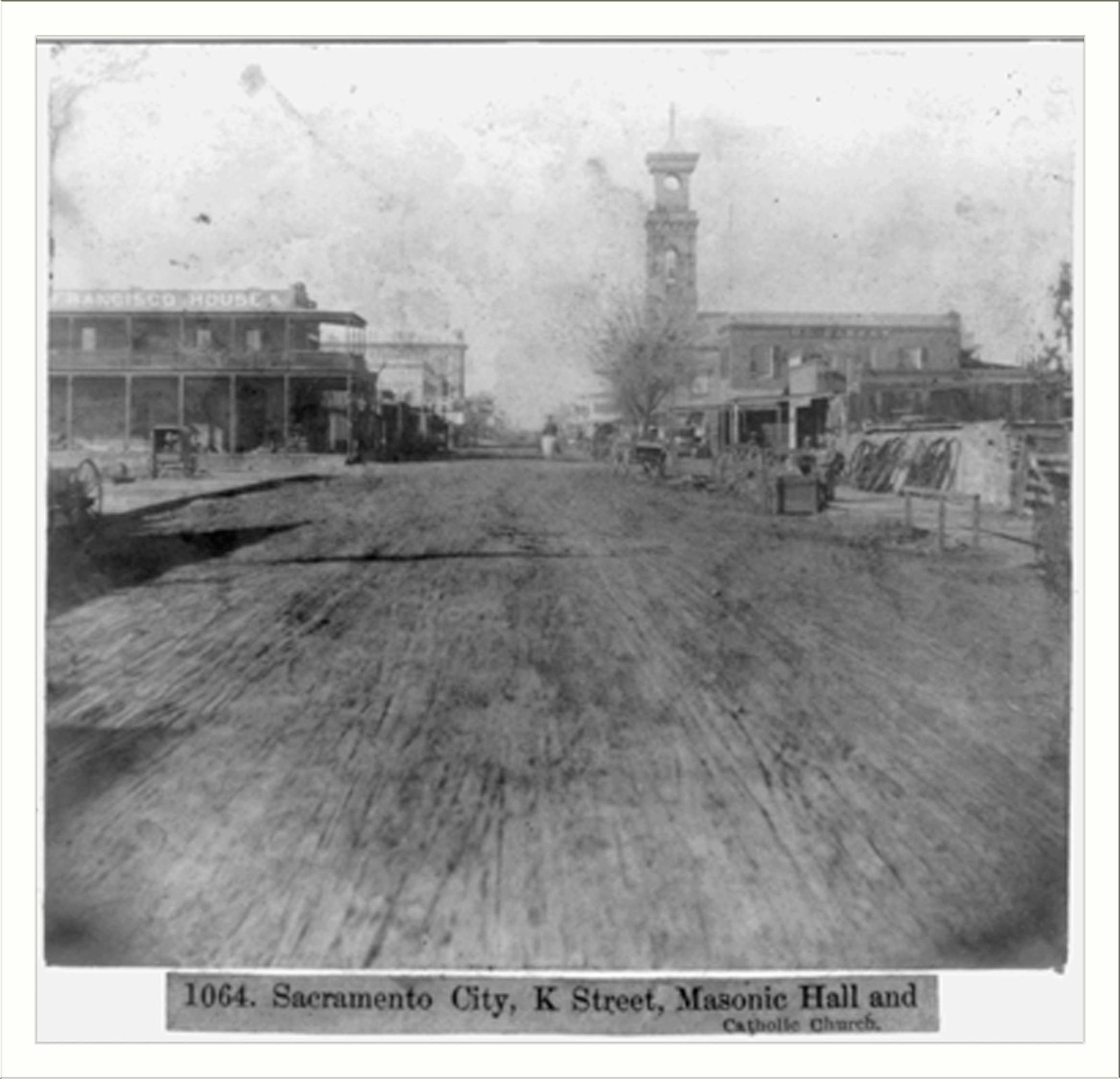 Sacramento City, K Street, Masonic Hall and Catholic Church, [published 1866] — historic photograph