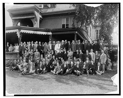 [President Theodore Roosevelt standing with members of the U.S. Olympic team]