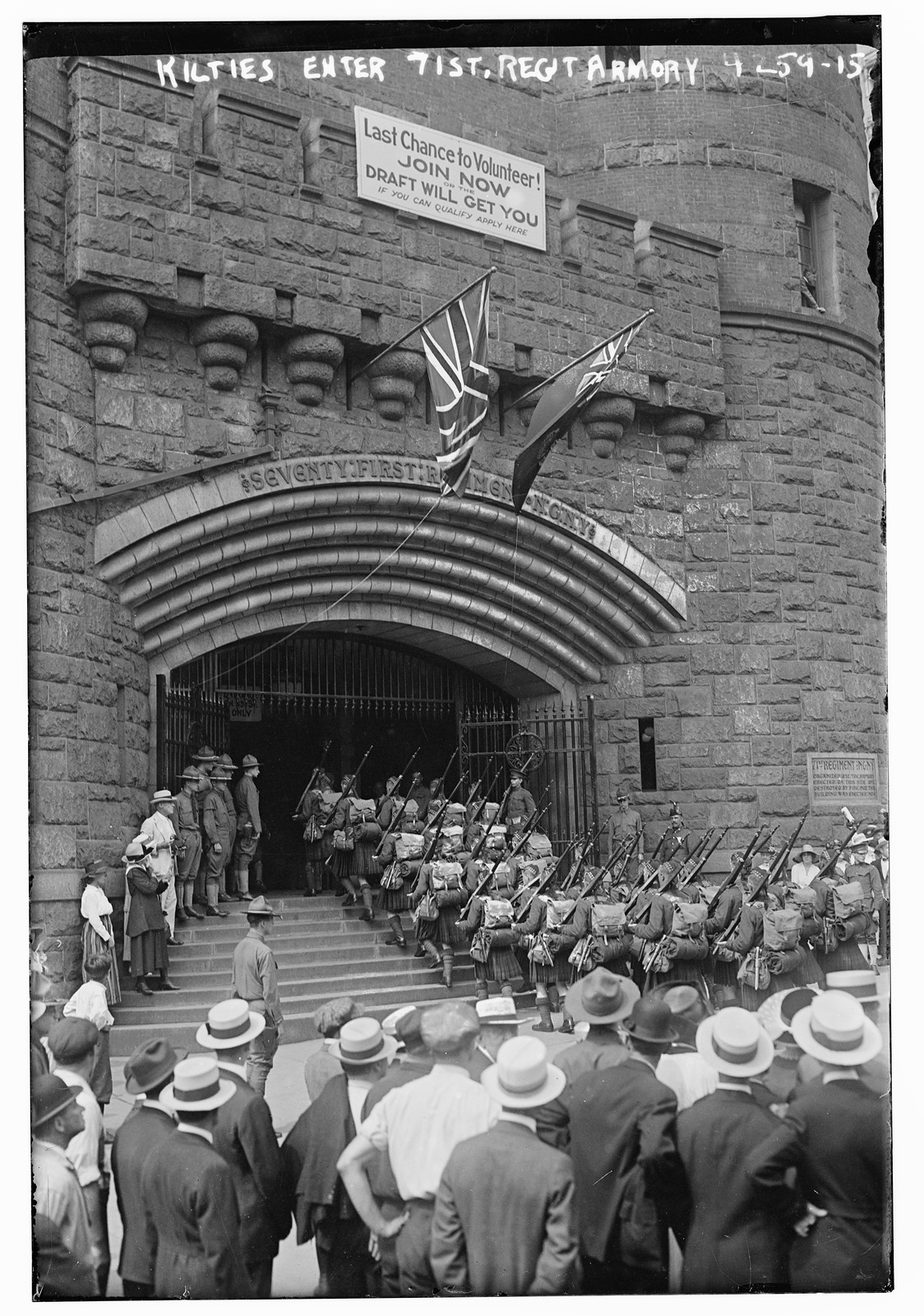 Kilties enter 71st Regt. Armory, n/a — historic photograph