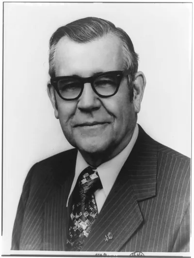 [Tim Lee Carter, head-and-shoulders portrait, facing left]