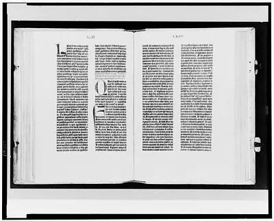 [Gutenberg Bible opened to the beginning of the Gospel of Luke]