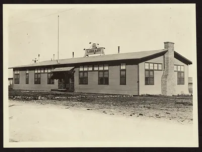 Library building with ALA and LIBRARY sign on roof