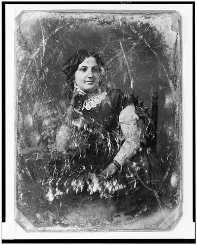 [Unidentified woman, three-quarter length portrait facing slightly right]