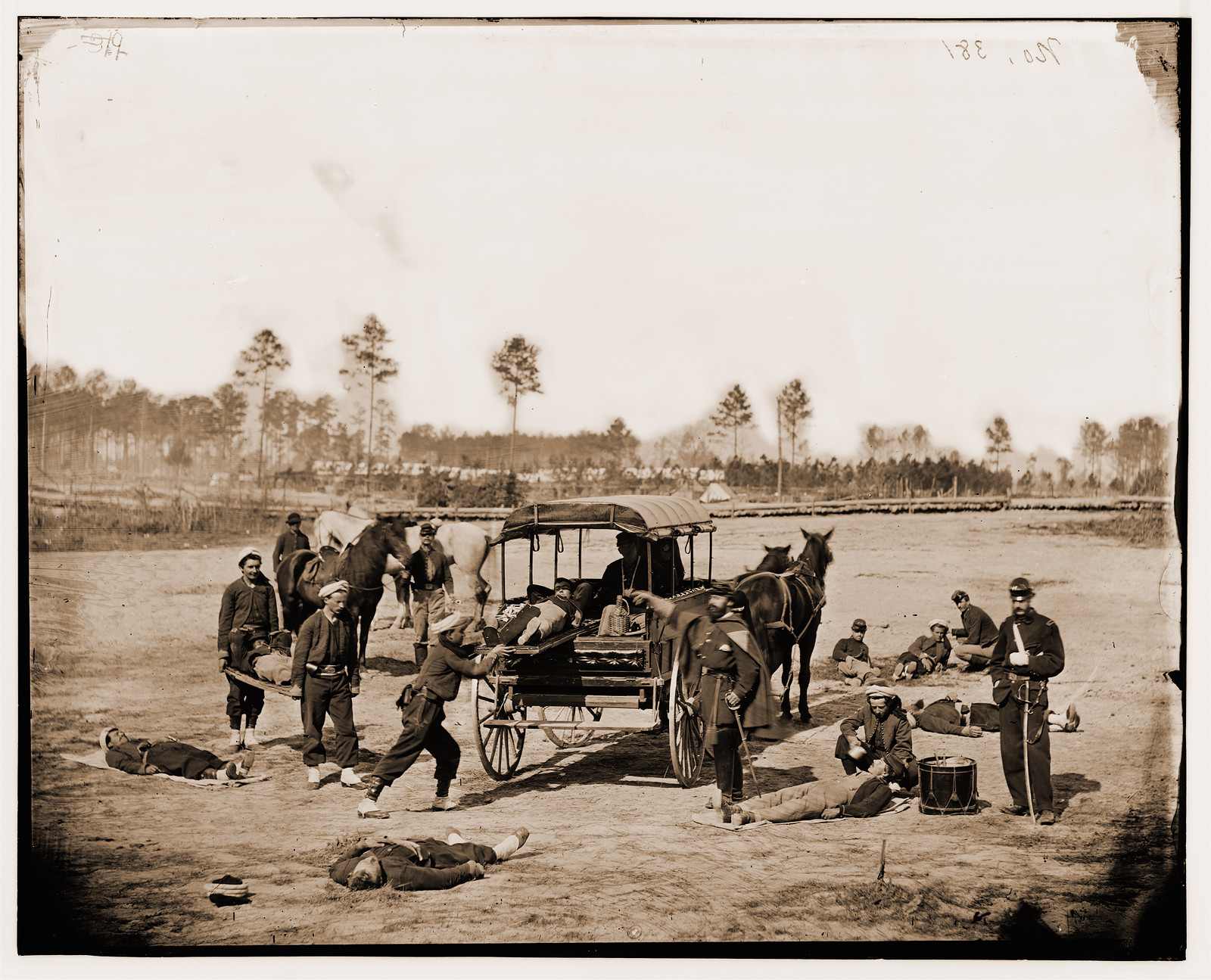 Zouave ambulance crew demonstrating removal of wounded soldiers from the field, 1862 — historic photograph