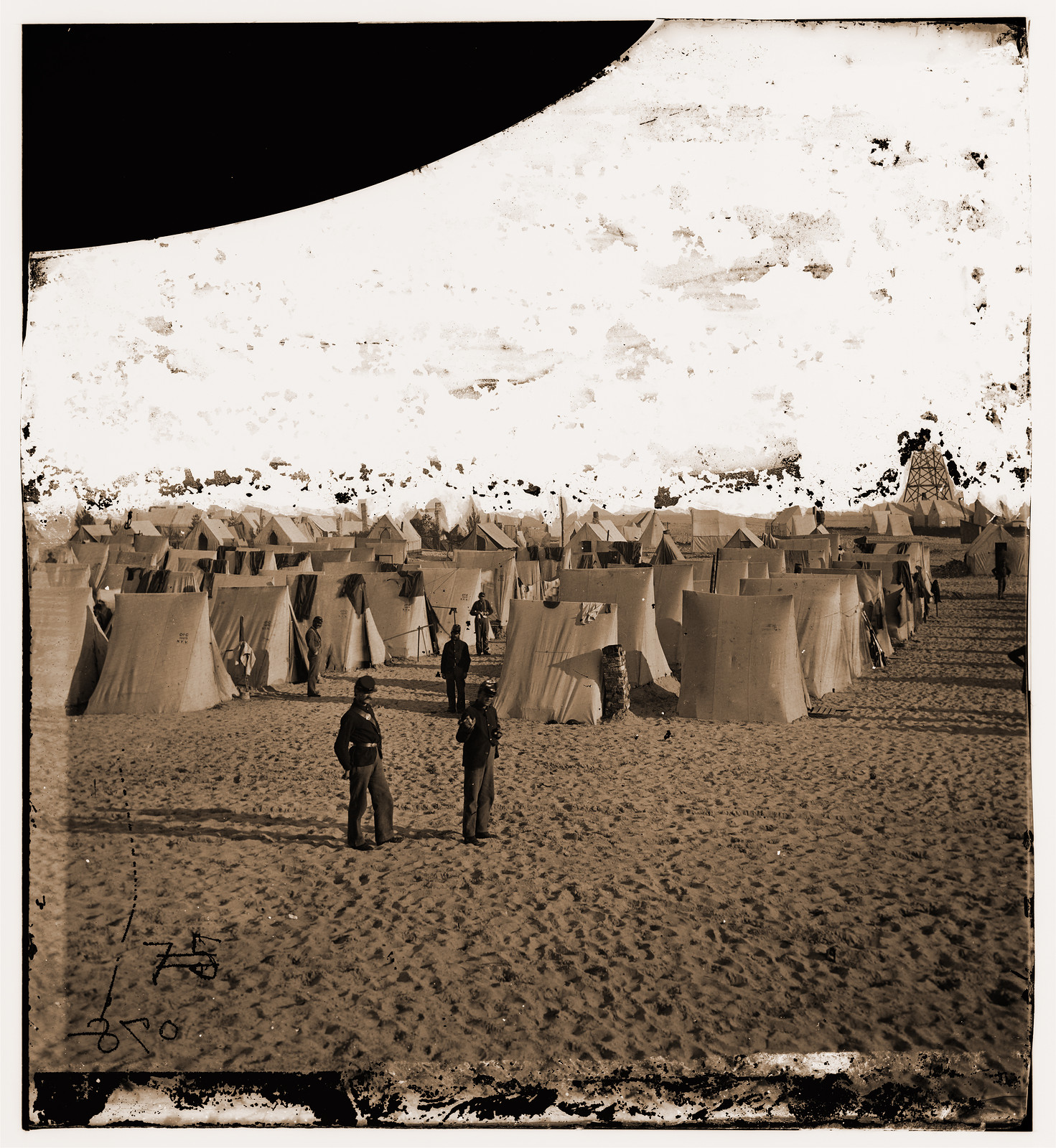 Camp on beach, 1861 — historic photograph