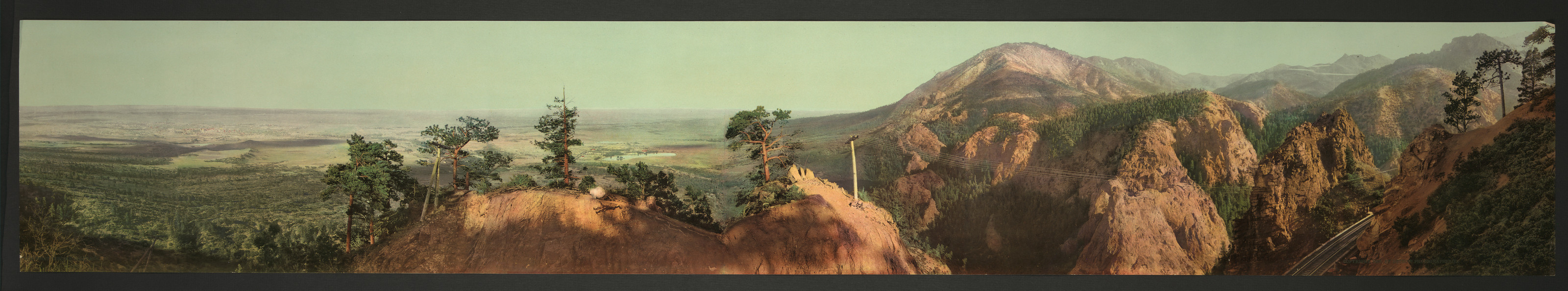 Panoramic view of red rock ridges and valley — historic image