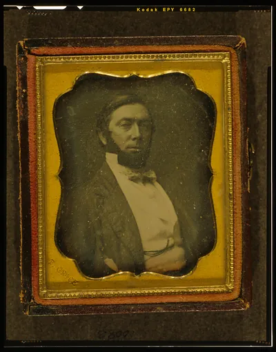 Daguerreotype portrait of a bearded man in a case