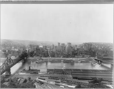 Pa. - Pittsburgh - panoramic view; rail yards and coal barges in foreground. July 2, 1915