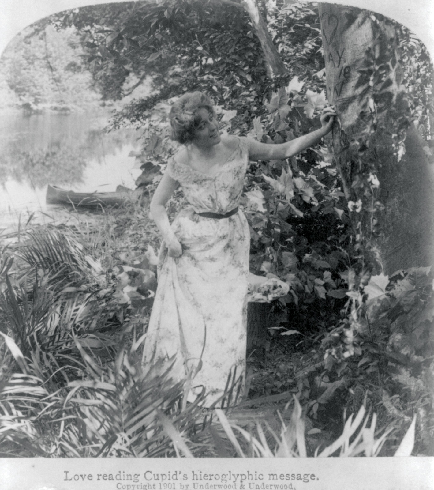 Love reading Cupid's hieroglyphic message — historic image