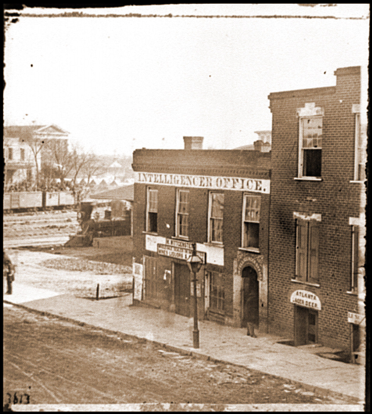Atlanta Ga. Atlanta Intelligencer office by the railroad depot, 1864 — historic photograph