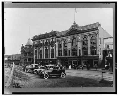 Town Building, early model automobiles