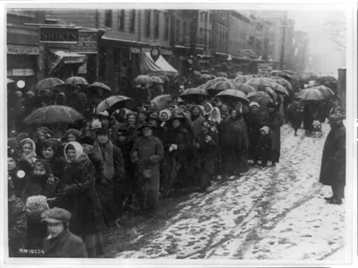 Newark women plod in snow to plea for food