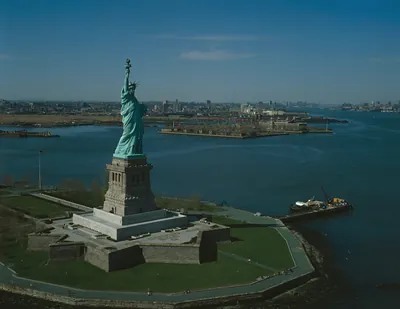 Aerial view of the Statue of Liberty and harbor