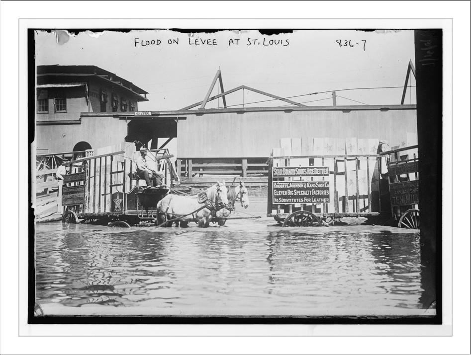 Horse-drawn shoe wagons flooded levee, St. Louis, 7/16/09. — historic photograph