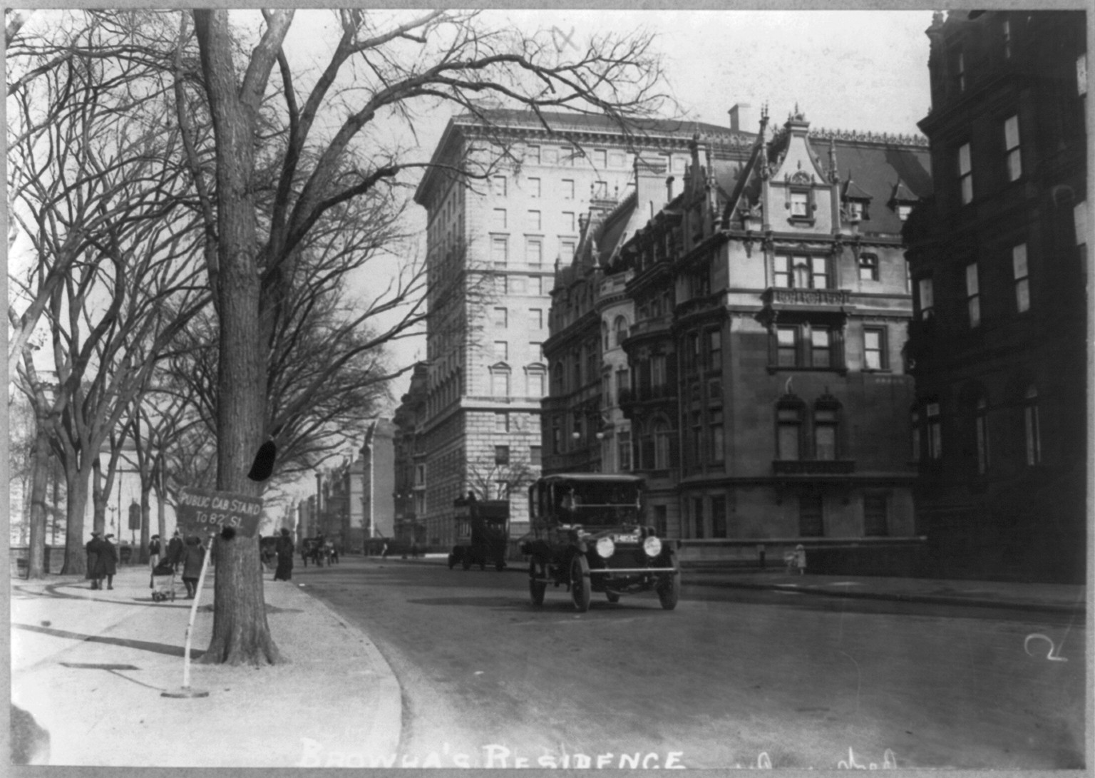 Highest priced apartment house on Fifth Ave.; house to right is Brokaw residence, 1913 Dec. 20. — historic photograph