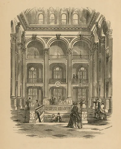 Interior view of a grand hall with galleries and columns