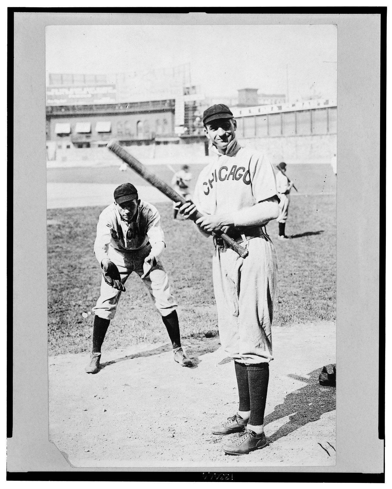 Baseball player in Chicago uniform holding a bat — historic image
