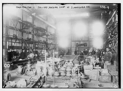 Workers in colliery machine shop of S. Manchuria R.R., Chien-Chin, Chai